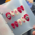 Trandy Red and offwhite Navratri Press on Nails With Beautiful Charms